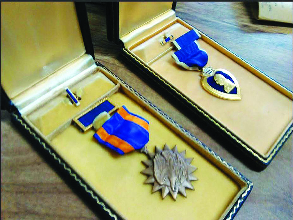 Air Medal and Purple Heart for service in WWII.