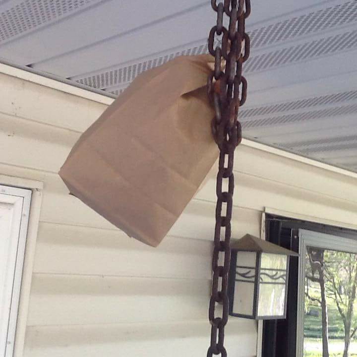 Bag Tied to the top of a porch!
